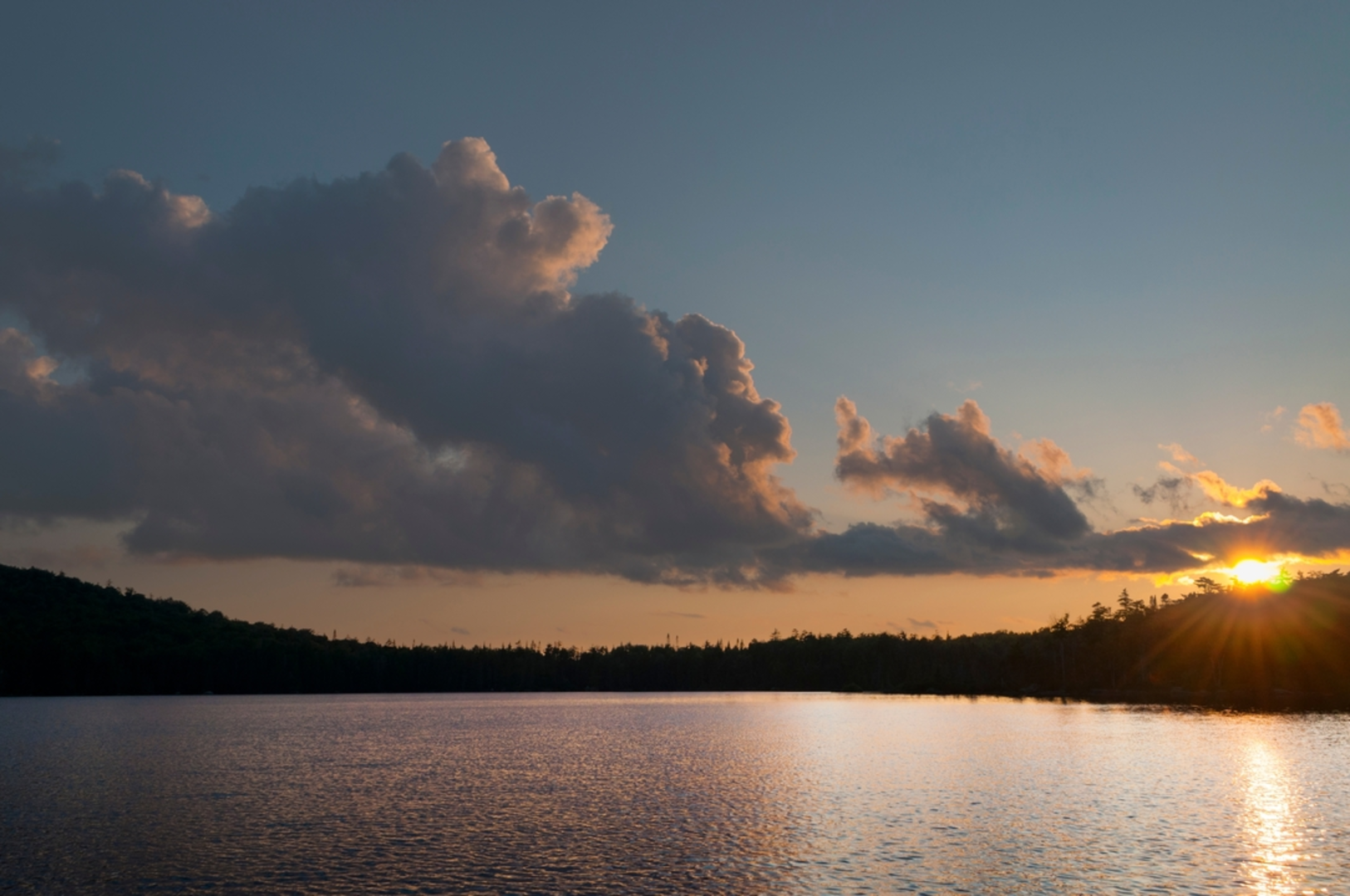 An image depicting the trail Sampson Lake Via French Louie Trail and its surrounding area.