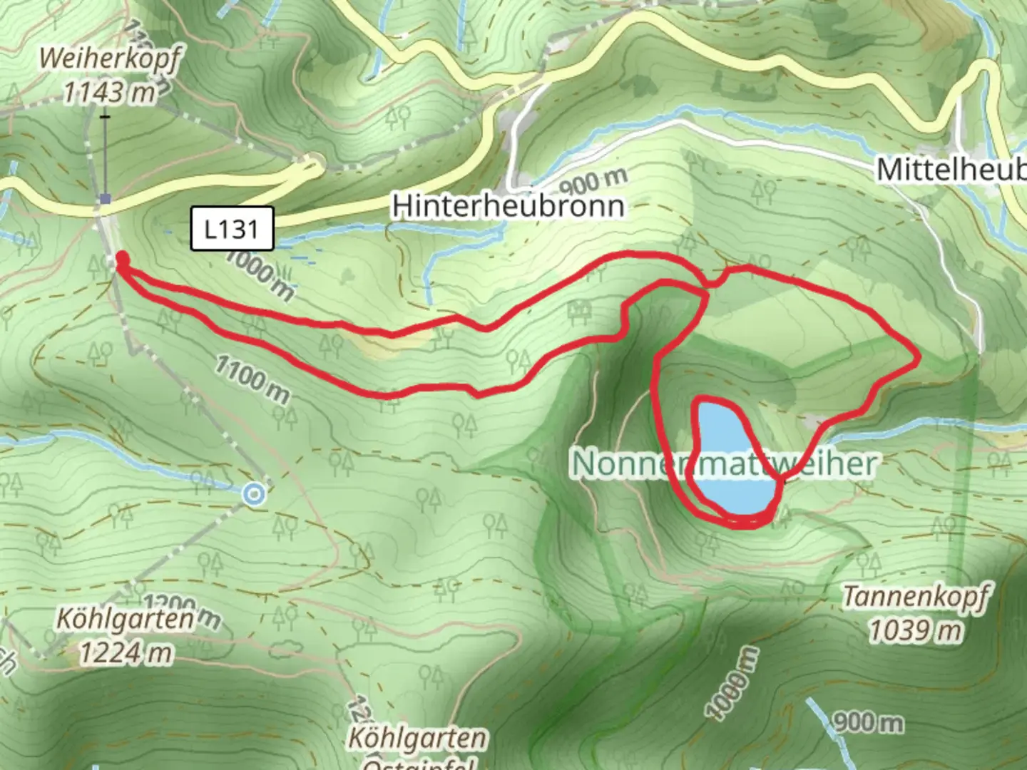 An image depicting the trail Nonnenmattweiher via Kreuzweg Parkplatz and its surrounding area.