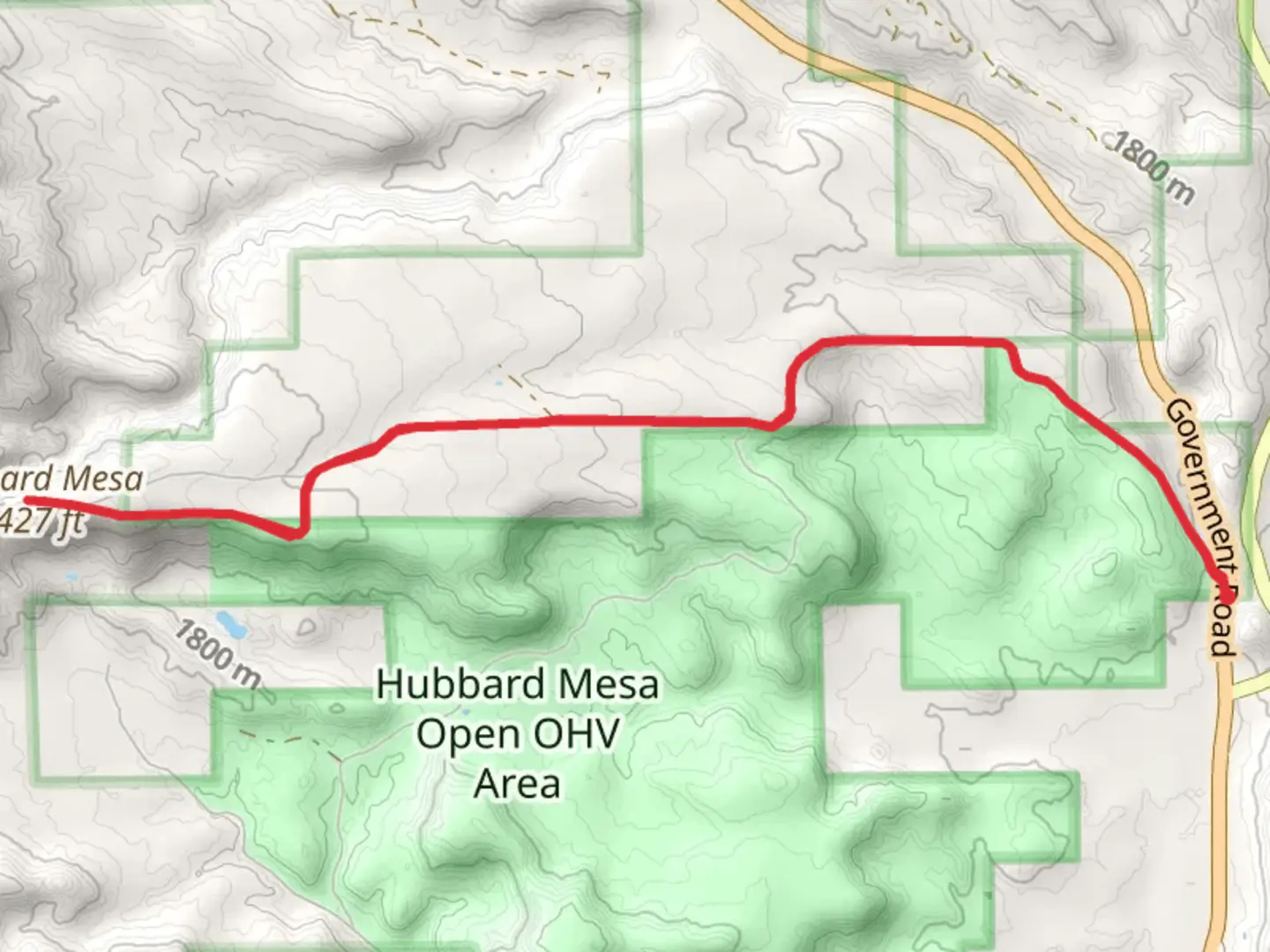 An image depicting the trail Hubbard Mesa from County Highway 242 and its surrounding area.