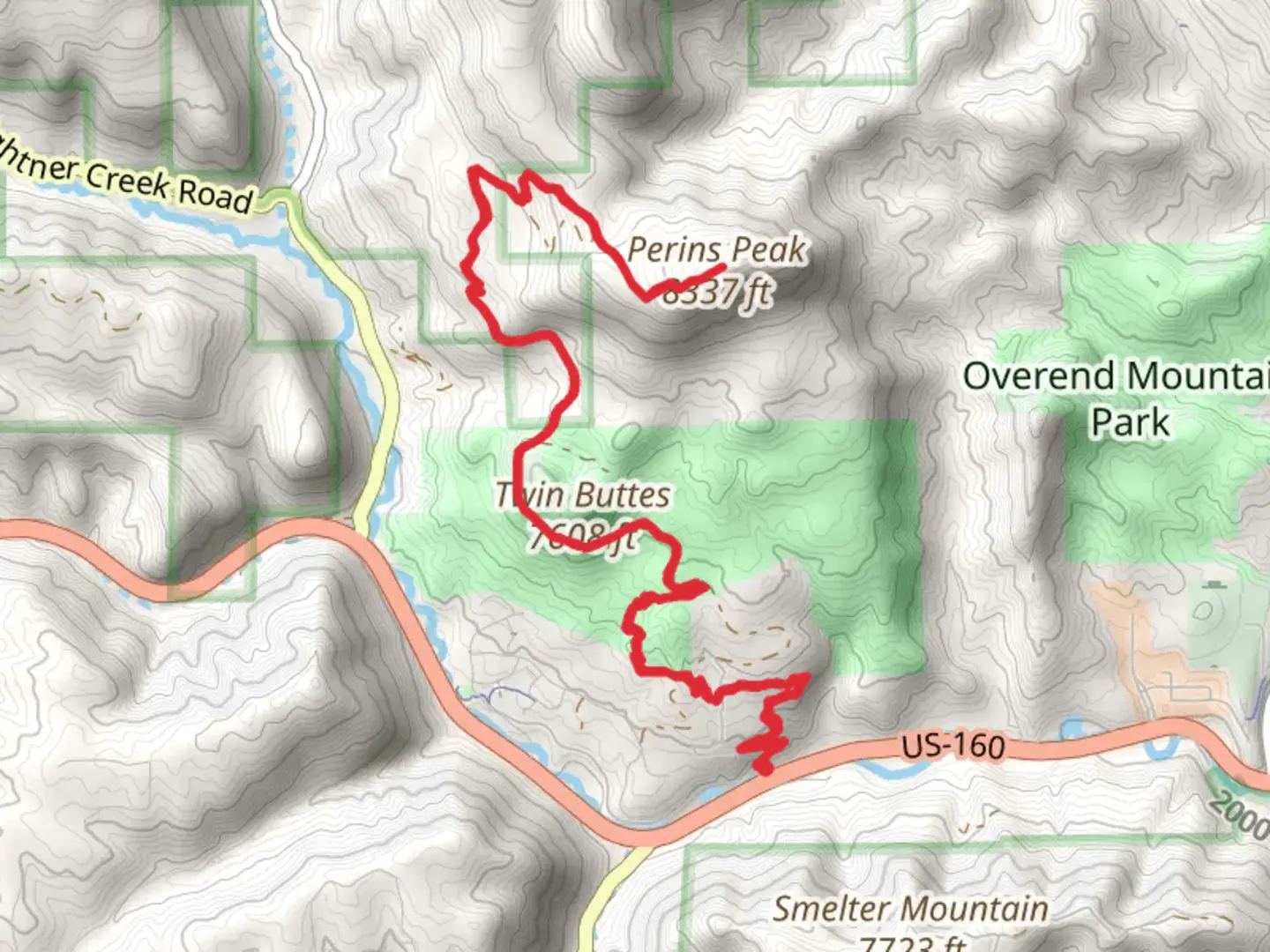 An image depicting the trail Twin Buttes and Perins Peak Walk and its surrounding area.