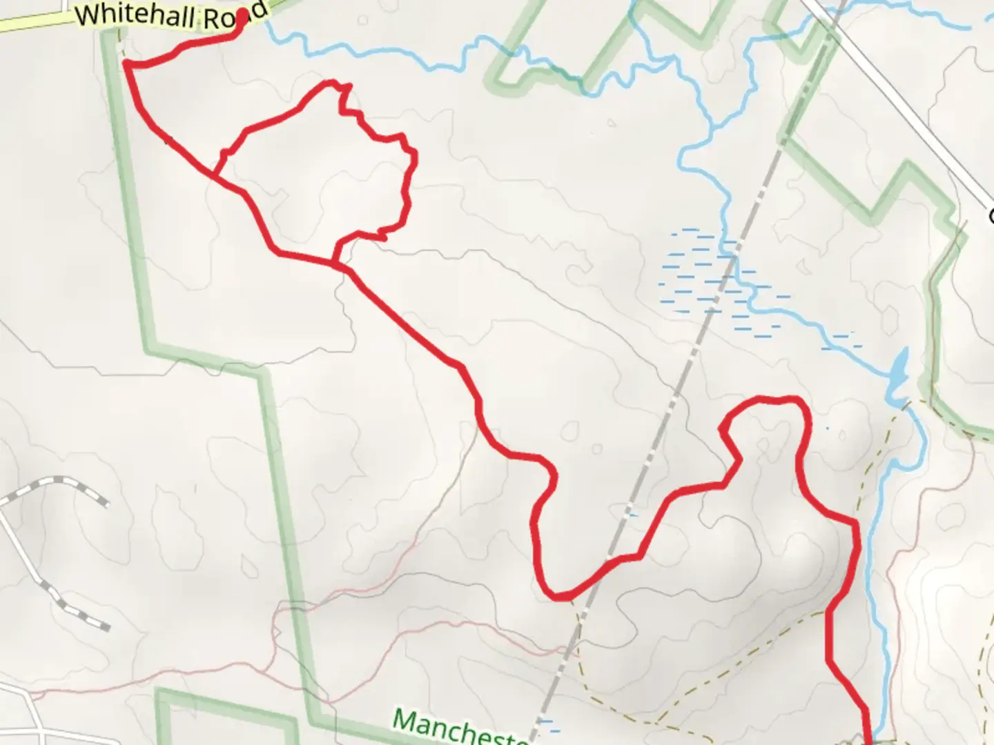 An image depicting the trail Dubes Pond to Tower Pond Trail and its surrounding area.