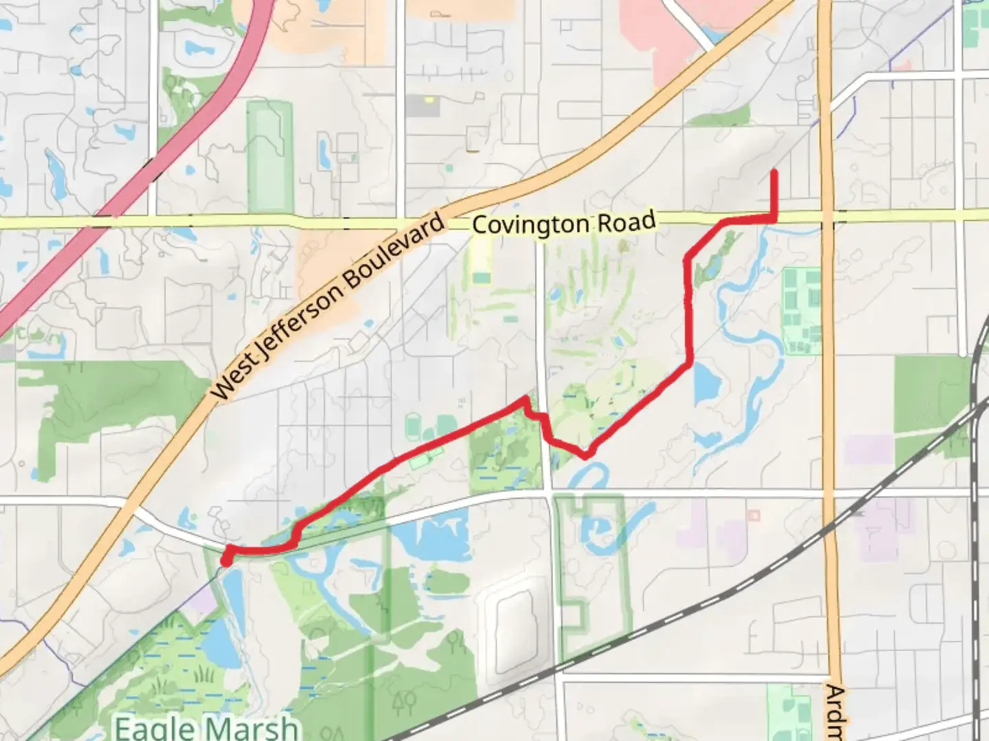 An image depicting the trail Towpath Trail and Mill Creek and its surrounding area.