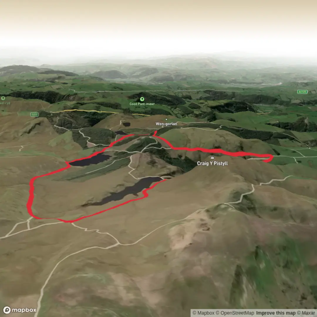 An image depicting the trail Llyn Craig-Y-Pistyll Waterfall Walk and its surrounding area.