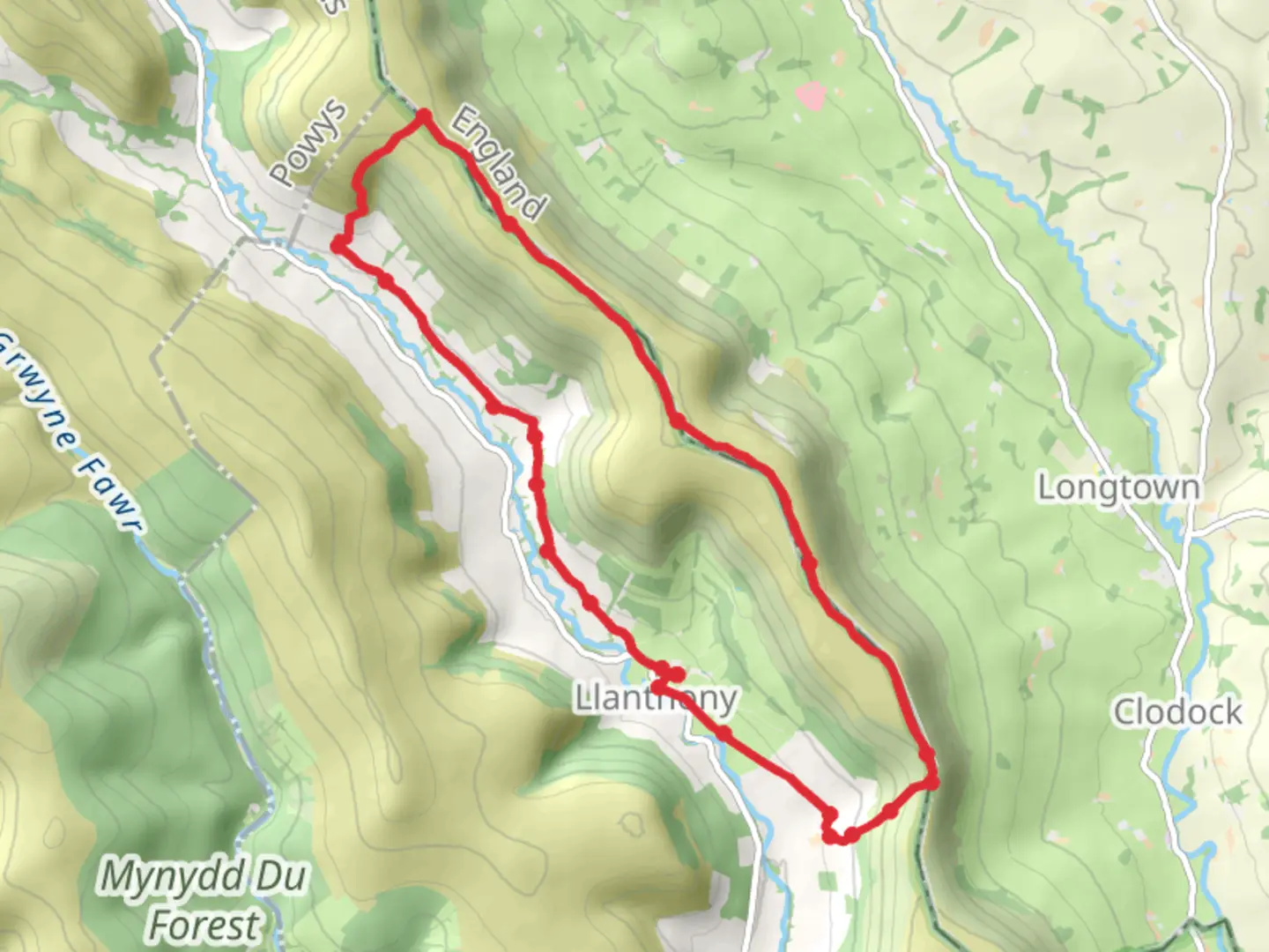An image depicting the trail Offas dyke ridge from Llanthony Priory and its surrounding area.