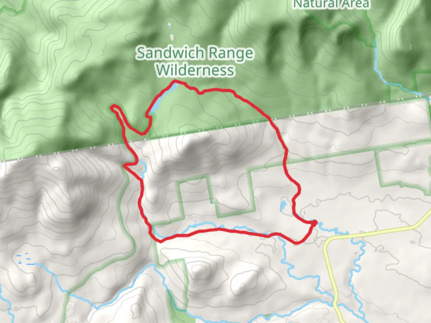 An image depicting the trail Flat Mountain Pond Trail Loop and its surrounding area.