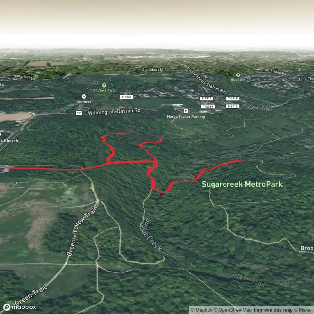 An image depicting the trail Green and Red Trail in Sugarcreek Metro Park and its surrounding area.