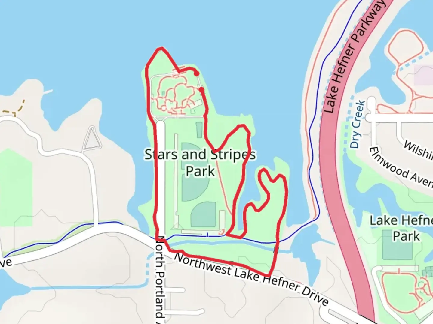 An image depicting the trail Stars and Stripes Park Loop and its surrounding area.