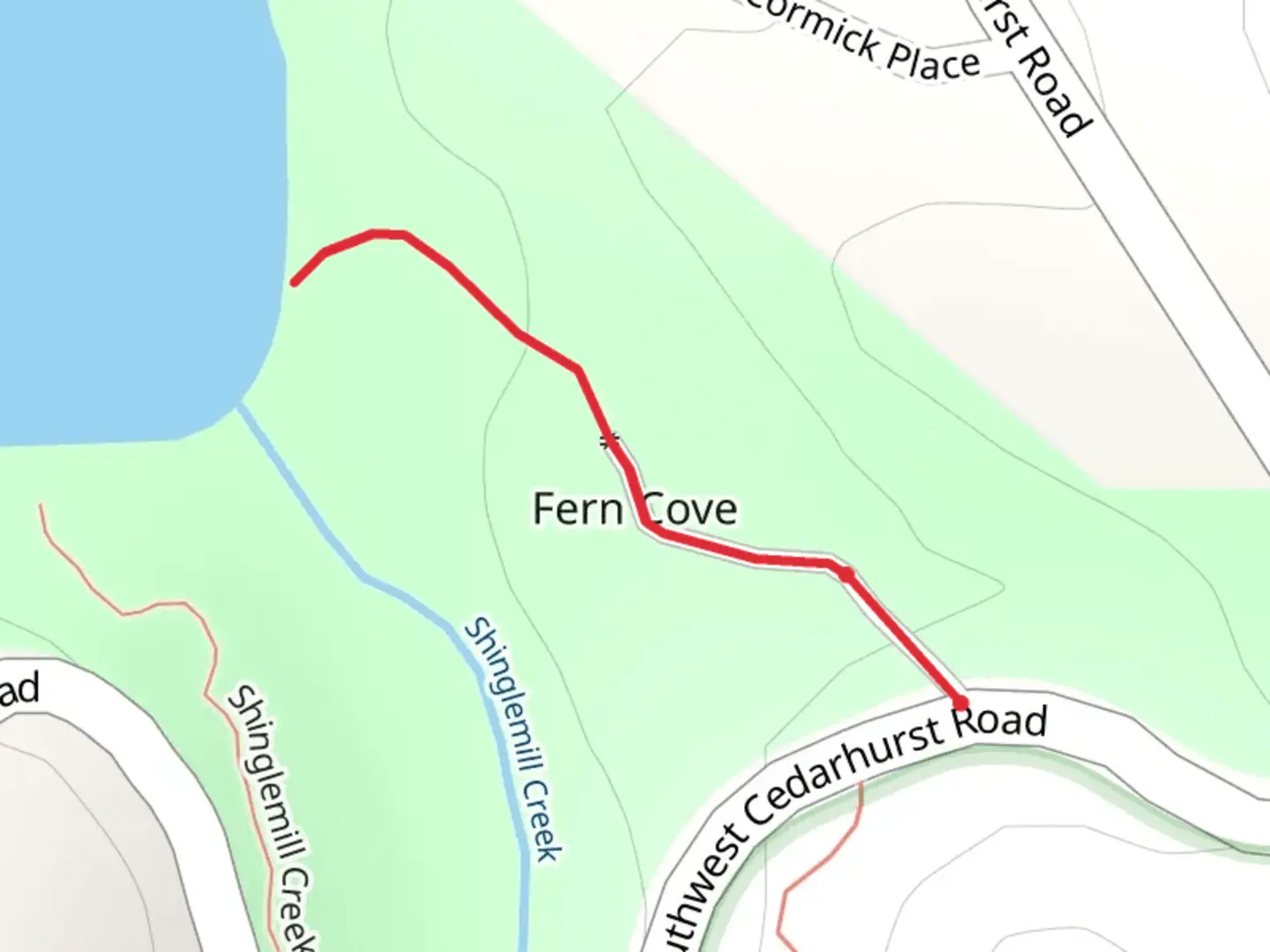 An image depicting the trail Belle Baldwin House at Fern Cove and its surrounding area.