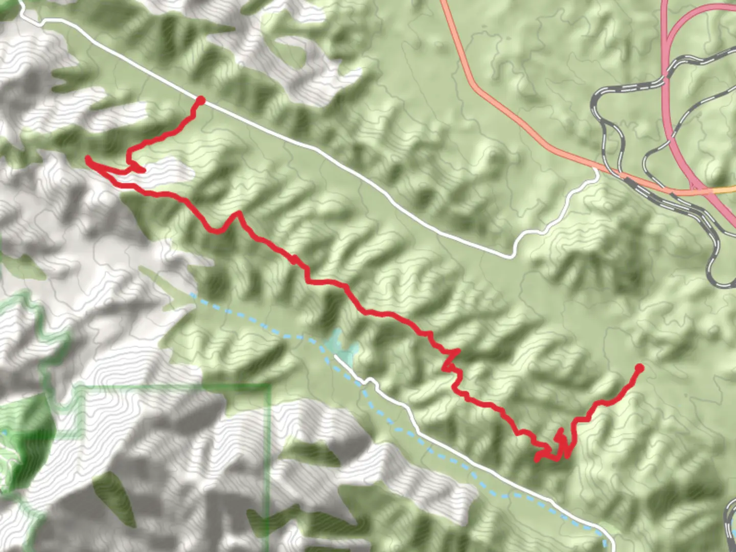 An image depicting the trail Sheep Canyon Road and Upper Lytle Creek Divide Walk and its surrounding area.