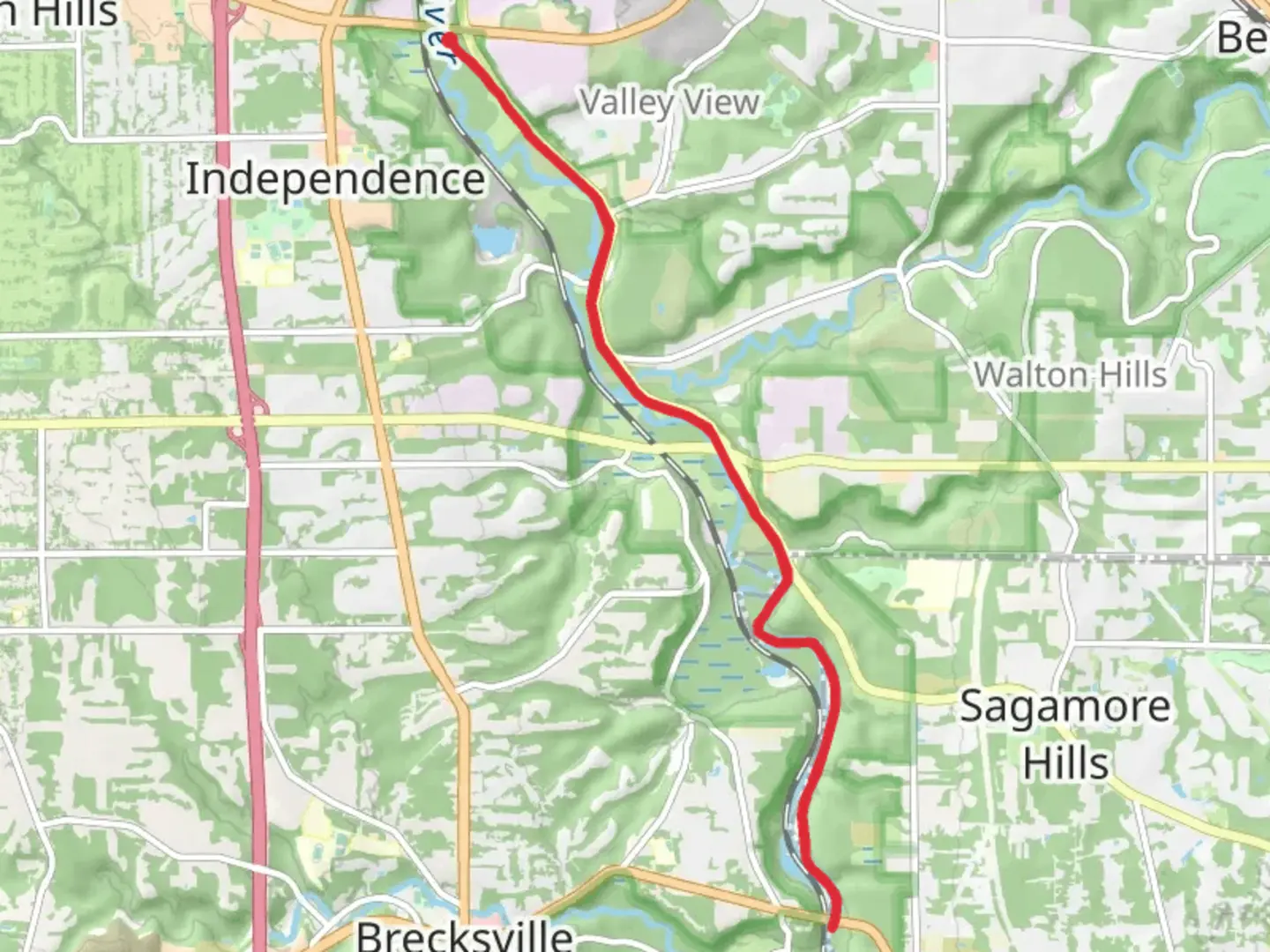An image depicting the trail Ohio and Erie Canal Trail and Cuyahoga River and its surrounding area.