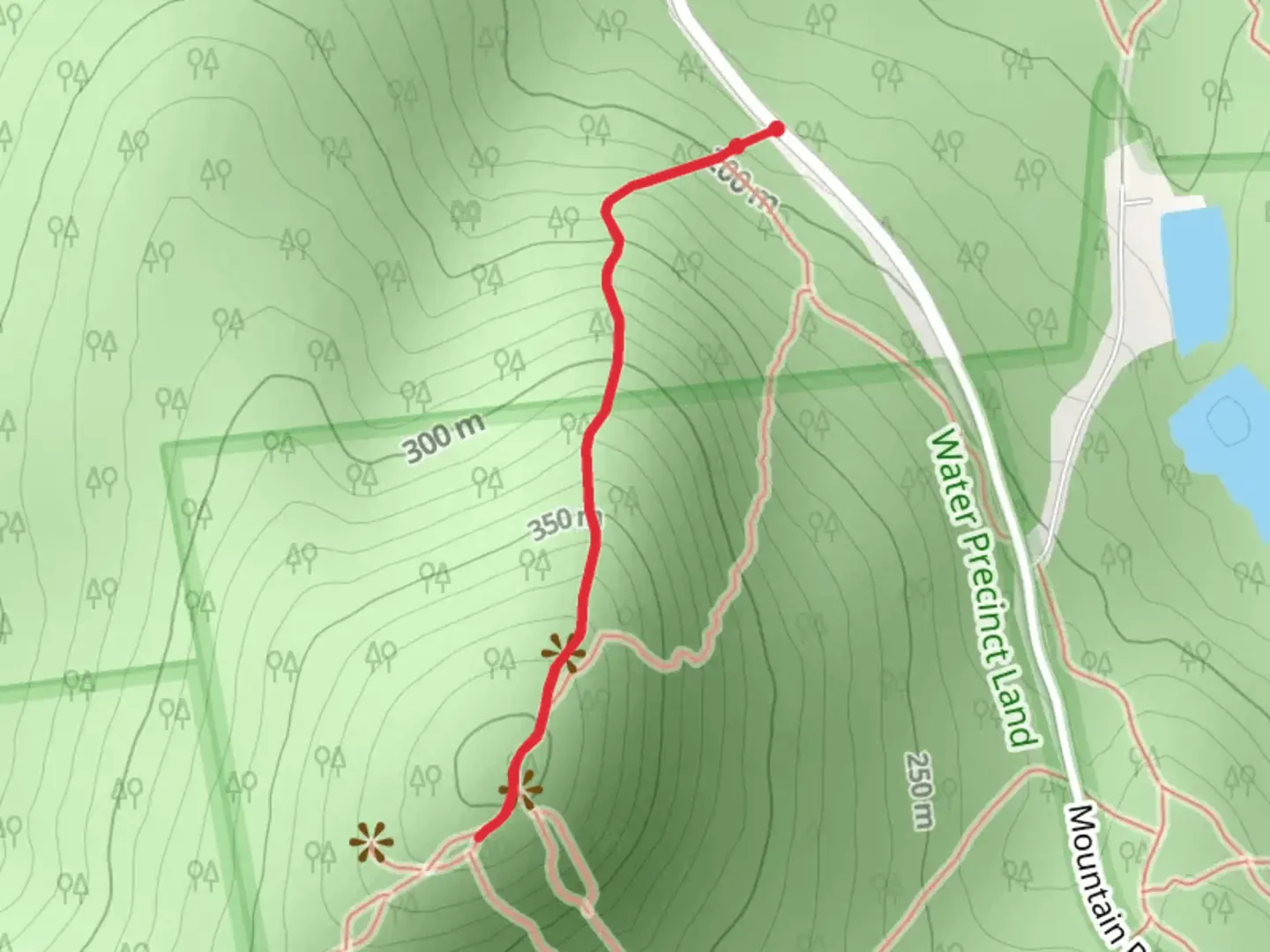 An image depicting the trail Mount Uncanoonuc Trail via Mountain Road and its surrounding area.