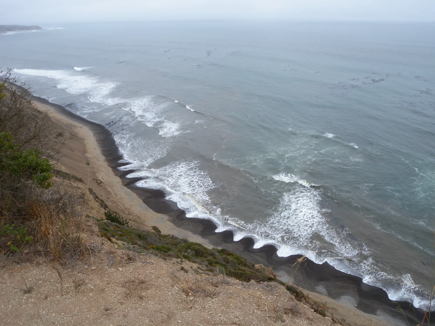 An image depicting the trail Bass Lake via Coast Trail and its surrounding area.